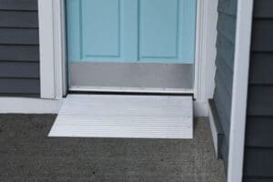 A door with a ramp on the floor