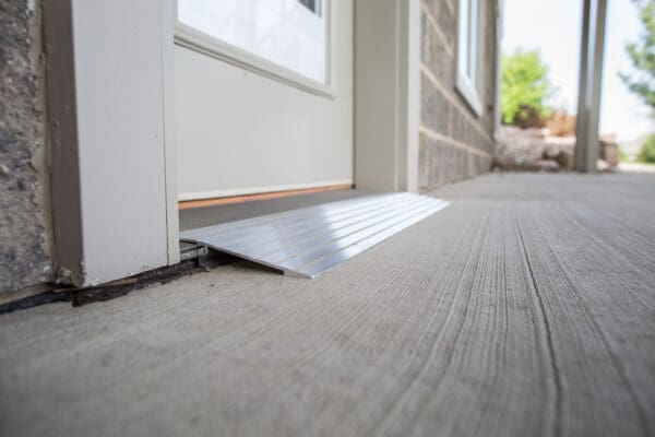 A door with a ramp on the floor